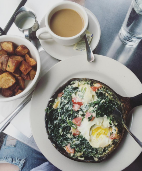 The Creamy Spinach Florentine Baked Eggs and Crispy Potatoes from Cornerstone Cafe.