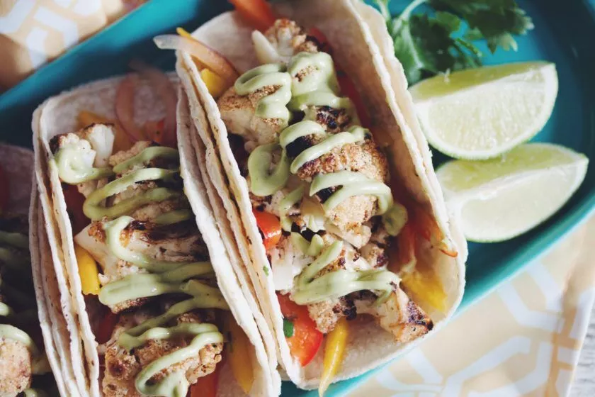 GRILLED CAULIFLOWER TACOS WITH MANGO SLAW AND AVOCADO CREMA BY HOT FOR FOOD